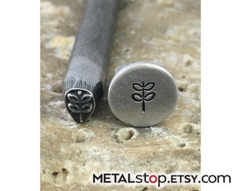 Leaf with stem steel design stamp measures 5mm tall by approx. 3.5mm wide design stamp for use with soft metals