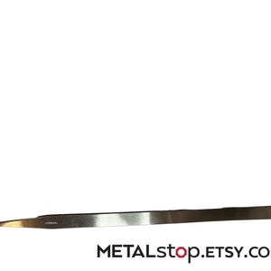 May include: A handmade wooden sign with the text "Welcome" in a playful font. The sign is painted white with a distressed finish, and features a small, decorative heart. Measures approximately 12 inches wide.