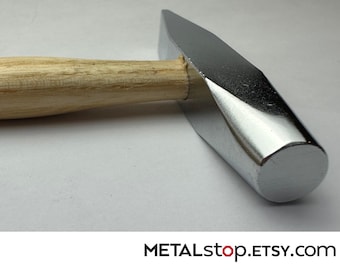 Riveting hammer 3/8" round face and opposite chisel-shaped end smooth surface
