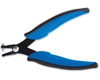 May include: A black and blue metal hand punch tool with a blue plastic handle.