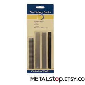 May include: A package of Pro Cutting Blades. The package includes three blades: rigid, flexible, and crimped, with a protective rubber edge. The packaging is blue and yellow with the text "Professional Quality" and "METALstop.ETSY.com".