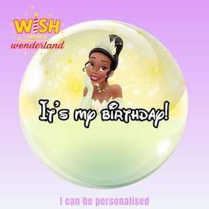 May include: A digital illustration featuring Princess Tiana from Disney's The Princess and the Frog inside a glowing bubble. Text reads "It's my birthday!" and "I can be personalised". The top left corner has the text "WESH upon a wonderland".