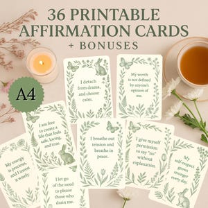 May include: A set of 36 printable affirmation cards with bonuses. The cards have botanical illustrations and positive affirmations. The image includes a lit candle, a cup of tea, and flowers, creating a calming aesthetic.