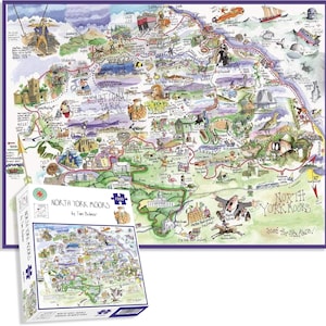 Puede incluir: Un mapa ilustrado de North York Moors, con dibujos caprichosos de lugares emblemáticos y figuras. Se muestra una caja de rompecabezas de 1000 piezas con el mismo diseño de mapa. El texto "NORTH YORK MOORS" es visible.