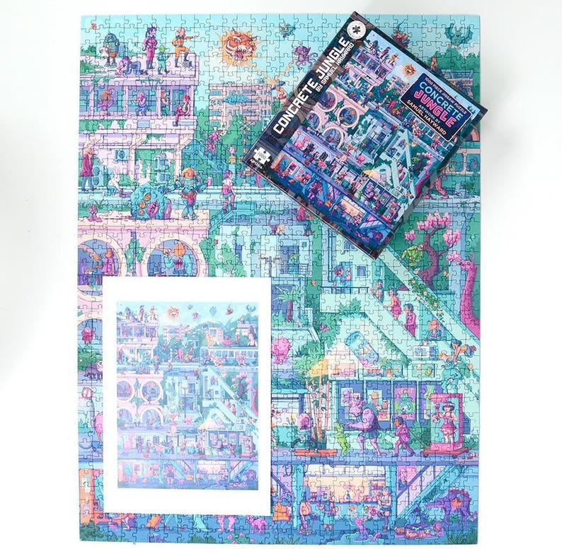 May include: A completed jigsaw puzzle with a colorful illustration of a city scene, with a matching puzzle box and a smaller print of the image. The puzzle features the text "CONCRETE JUNGLE" and is set against a white background.