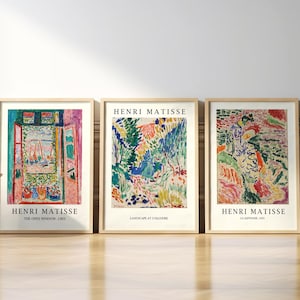 Könnte beinhalten: Drei gerahmte Kunstdrucke mit farbenfrohen abstrakten Gemälden von Henri Matisse. Die Drucke sind betitelt mit "Das offene Fenster, 1905", "Landschaft in Collioure" und "Der Tanz, 1910".