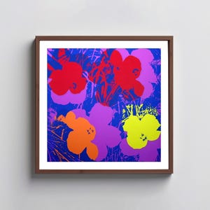 May include: A colorful abstract print featuring five flowers in shades of red, orange, yellow, purple, and blue against a blue background.