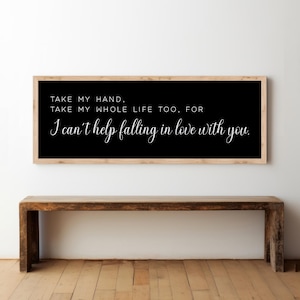 Puede incluir: Señal negra enmarcada con texto blanco que dice "TAKE MY HAND, TAKE MY WHOLE LIFE TOO, FOR I can't help falling in love with you."