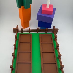 Grow a Garden Roblox 3 piece bundle. Plot, carrot, and candy blossom.