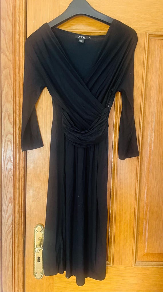backless maxi black dress Kiah Long Sleeve Backless Maxi Dress in Black