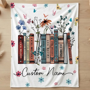 May include: A set of three ceramic mugs with a speckled, matte finish in cream, light grey, and dark grey. Each mug has a simple, minimalist design, suitable for coffee or tea.