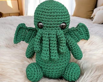 Guia em PDF para o padrão de crochê amigurumi de Cthulhu, criatura mítica.