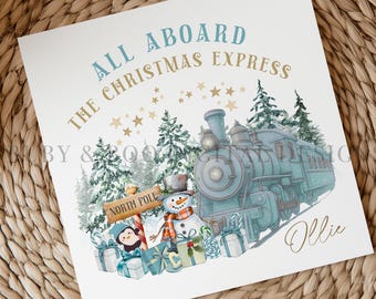 May include: A square print featuring a blue train, snowman, and penguin with the text "All Aboard The Christmas Express" and "North Pole". The print has a winter theme with gifts and trees.