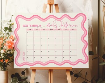 May include: A pink and white baby shower calendar on an easel. The calendar reads "Guess the Arrival of Baby Jefferson" and includes a calendar grid for May 2026. The design features a wavy pink border.