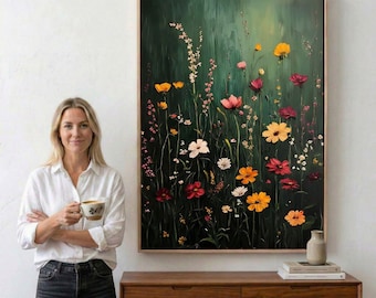May include: A large rectangular framed wall art piece featuring an oil painting of a wildflower meadow against a dark forest green background. The artwork displays various flowers in shades of yellow, orange, pink, and deep red on thin stems.