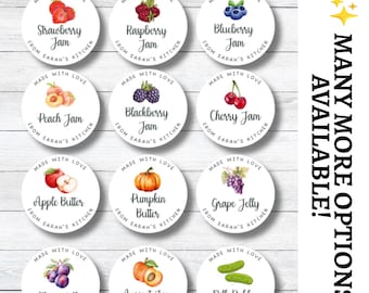 May include: Twelve circular white canning labels featuring watercolor illustrations of fruits and vegetables, including strawberries, raspberries, blueberries, peaches, blackberries, cherries, apples, pumpkins, grapes, plums, apricots, and dill pickles.