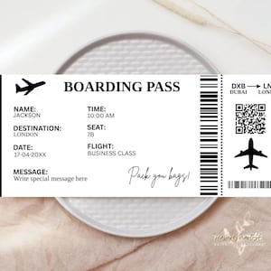 May include: A black and white boarding pass with the text "BOARDING PASS" and "Pack you bags!" The pass is for a flight from Dubai to London. The flight is in business class. The date of the flight is 17-04-20XX. The time of the flight is 10:00 AM. The seat number is 7B. The name of the passenger is Jackson.