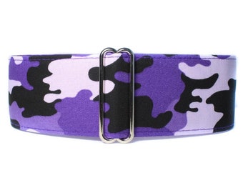 May include: Purple, black, and white camouflage patterned dog collar with a silver metal buckle.