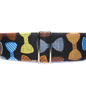 Bow Tie Martingale Dog Collar.  Colorful, preppy bow ties on a black background and fully lined with satin.  Great for those boy puppers!!
Available in sizes small to extra large.