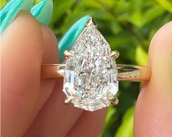 3ct Step Cut Pear Moissanite Engagement Ring: 14K Yellow Gold Teardrop Solitaire