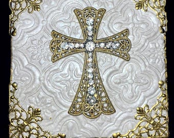 Art canvas with a gold metal cross
