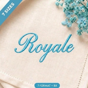 May include: A light beige fabric featuring the word Royale embroidered in a bright blue cursive script. A cluster of small light blue flowers is positioned in the upper right corner. A blue diagonal banner in the top left reads 7 SIZES.