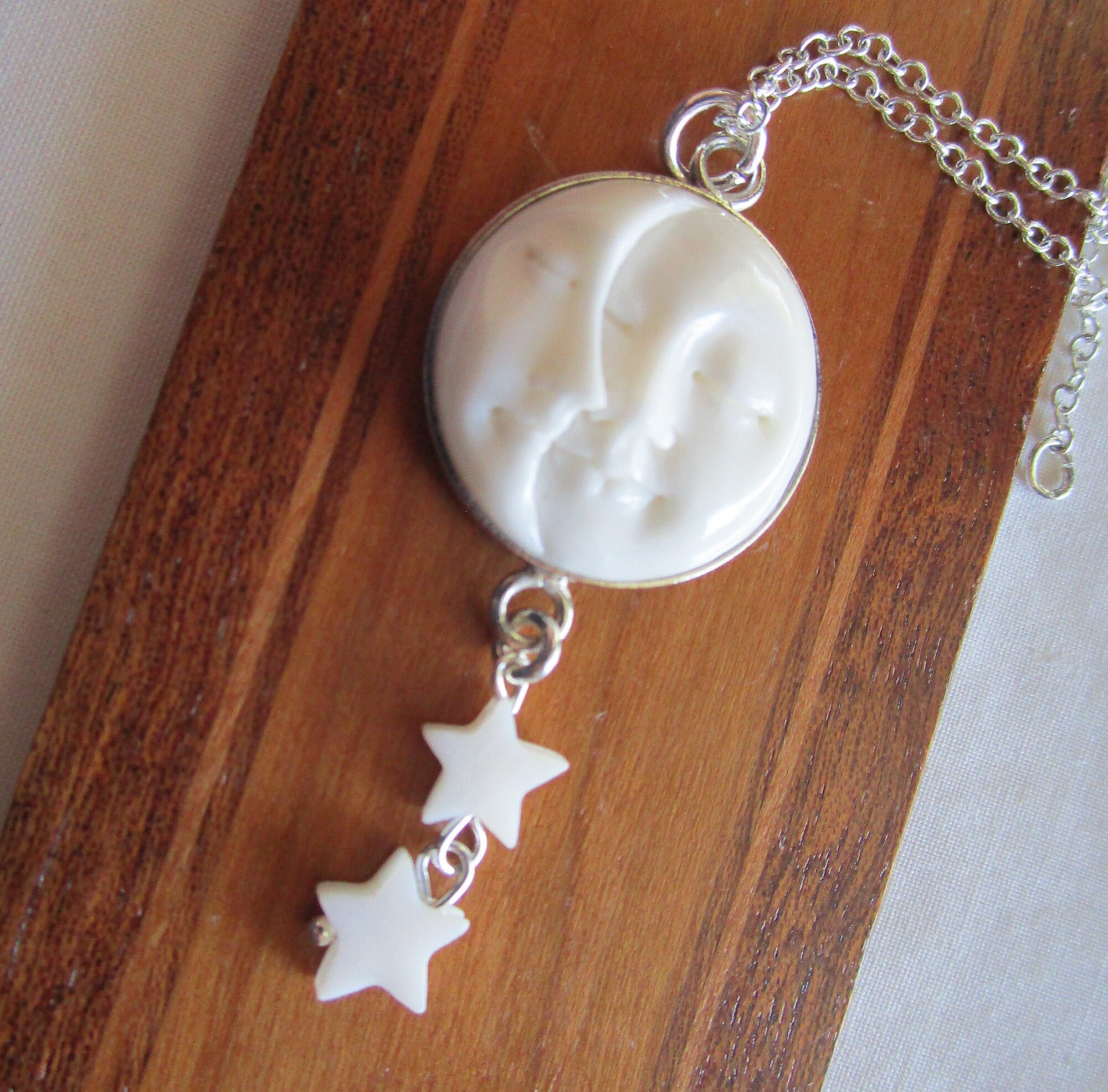 Bone moon and star on sale necklace