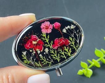 Pastillero de 2 compartimentos con flores secas