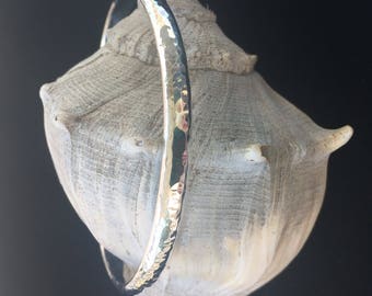 Hand forged sterling silver bangle