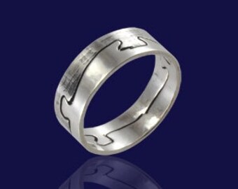Puzzle ring in sterling silver.
