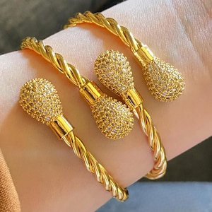 2-Piece Gold Plated Crystal Pavé Cable Bracelets 2 Pieces  Luxury Twisted Bangles with Sparkling Stone  Adjustable Statement Cuffs for Women