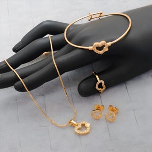 Gold-Plated Heart Jewelry Set – Necklace, Bracelet, Earrings & Ring