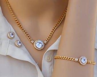 Elegante conjunto de joyas bañadas en oro con detalles de cristal brillante / Collar, pulsera y pendientes de novia