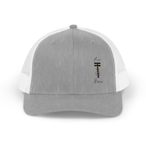 May include: A gray and white trucker hat with a black and white logo that says "Core Racing" and a graphic of a racing car part.