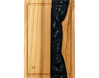 Tabla de cortar KAAMUT® de madera maciza de olivo con resina epoxi de obsidiana – 42×27×2,2 cm – Con ranura para savia – Diseño duradero y atemporal