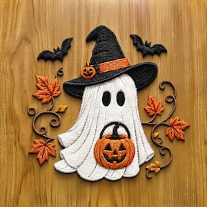 May include: An embroidered patch featuring a white ghost wearing a black witch hat with an orange band and a small pumpkin accent. The ghost holds an orange jack-o'-lantern bucket. Two black bats, orange maple leaves, and brown vines surround it.