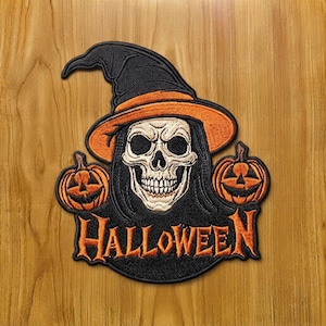May include: An embroidered patch featuring a skull wearing a black witch hat with an orange band, flanked by two orange jack-o'-lanterns. The word HALLOWEEN is stitched in orange capital letters at the bottom against a black background.