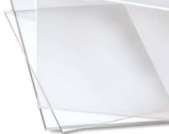 May include: A stack of clear, transparent acrylic sheets. The sheets are rectangular and appear to be of uniform size. The edges of the sheets are visible, showing the thickness of the material. The image is well-lit, highlighting the clarity of the acrylic.