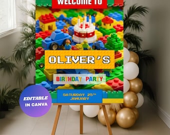 May include: A wooden easel displays a colorful birthday party sign. The sign reads "WELCOME TO OLIVER'S BIRTHDAY PARTY" with the date "SATURDAY 25TH JANUARY". The background features toy blocks and a cake.