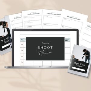 May include: A laptop displaying a photo shoot planner with a black background and white text. Several sheets of paper with checklists and schedules are arranged around the laptop. A book titled "Photo Shoot Planner" is also visible.