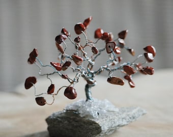 Gift idea for luck and good luck charms. Lucky tree, bonsai tree with gemstones. Red jasper symbolizes strength and endurance.