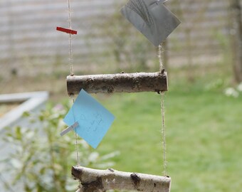 Gift for the office, study, hallway, or kitchen. Creative gift idea: wall decoration note and photo holder made of wood, branches. Rustic decorative note