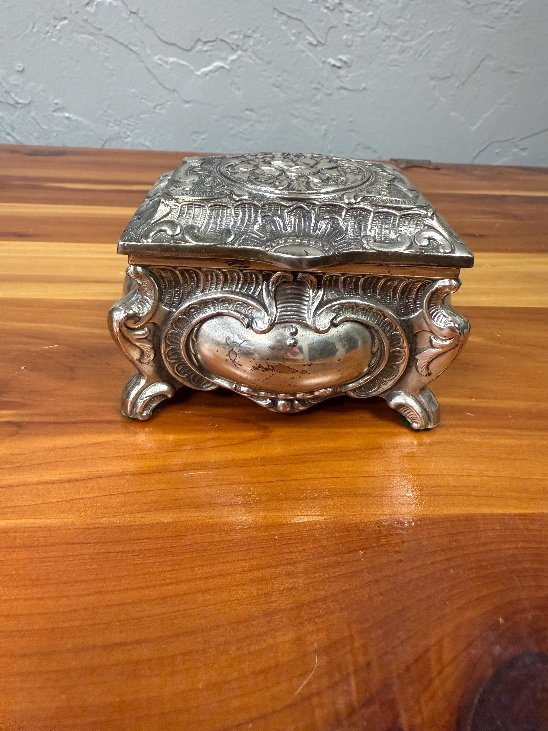 vintage silver-toned jewelry or trinket box