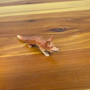 hand-carved wooden fox figurine