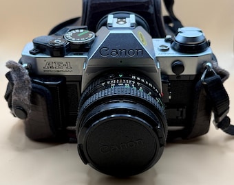 ヴィンテージ Canon AE-1 35 mm フィルムカメラ、50 mm F1.8 FD レンズ