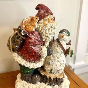 ceramic santa with fish and fishing pole Fishing Santa Claus Figurine