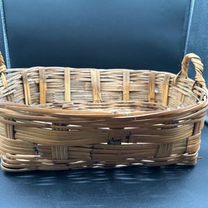 Vintage rectangular wicker basket with handles, gathering basket