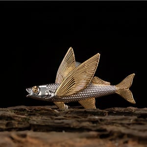 Original design flying fish brooch, white copper gold-plated Marine creature cap pin badge, retro artistic couple accessory