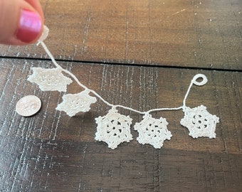 Miniature unique snowflakes garland,