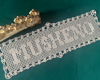 Crocheted last name doily,